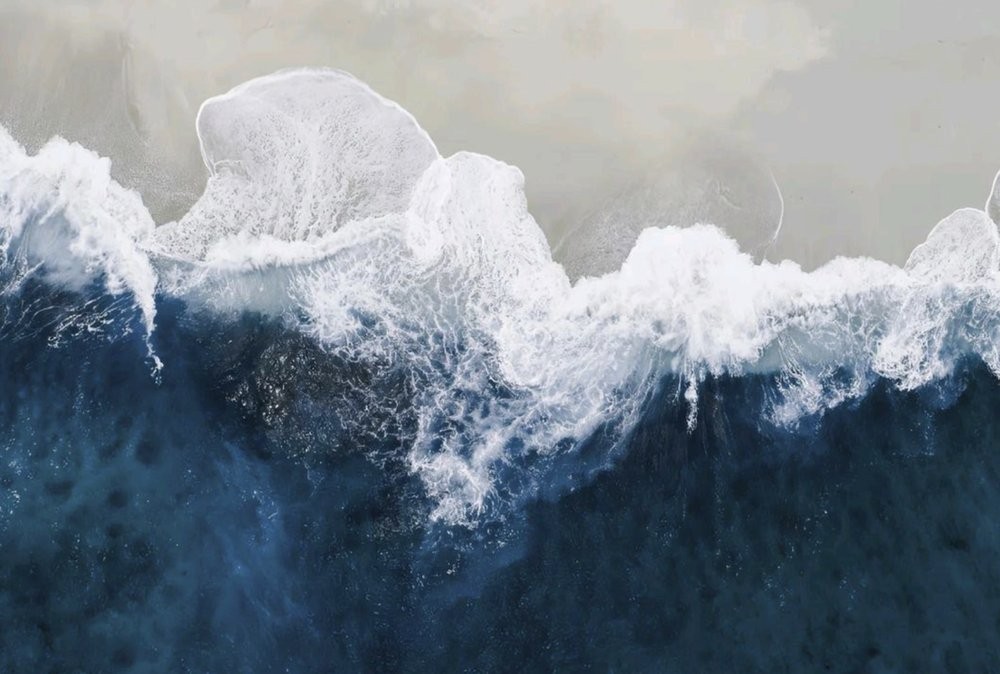Aerial view of a breaking wave